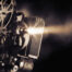Sepia-toned image of an old movie camera
