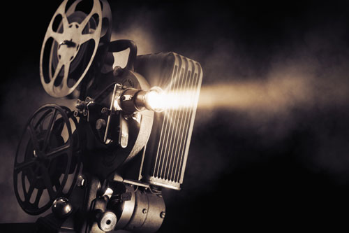 Sepia-toned image of an old movie camera