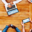 Aerial view of a group of people using technology