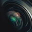 Beautiful camera lens with geen and pink light of glass on a black background.