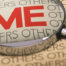Page that says others, with a large red ME magnified by a magnifying glass