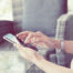 Hands using an iphone