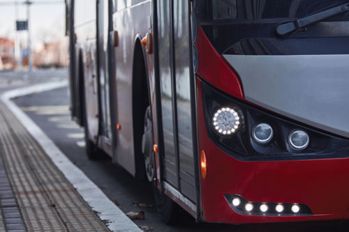 Public transportation bus in urban surroundings.