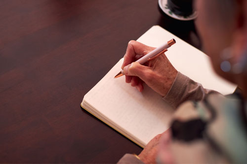 Close up shot of a hand writing.